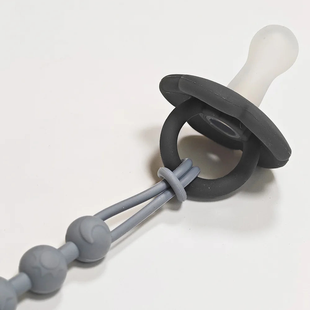 Attache tétine bébé bois et silicone